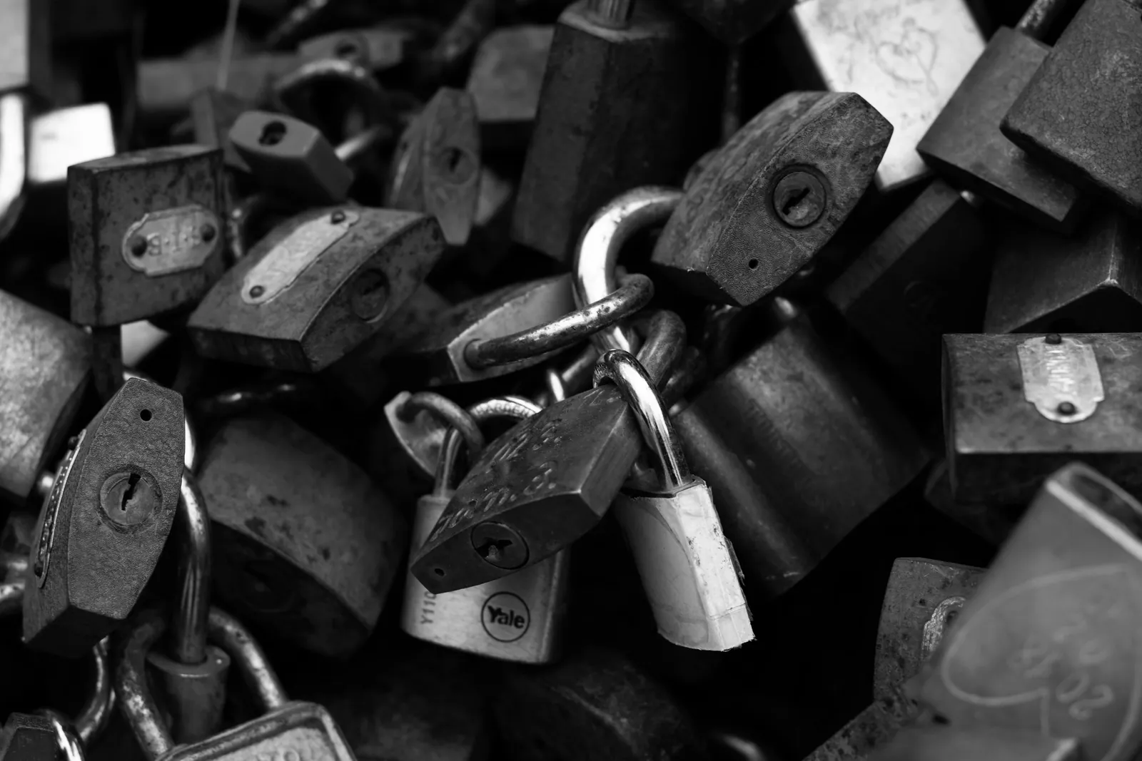 Pile of assorted rusty padlocks